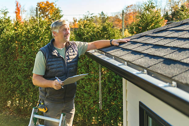 Professional Roof Repair technician working in Douglas, MI